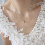 Diamond-shaped double-ring color-changing necklace, titanium steel plated with gold and silver color AL1236