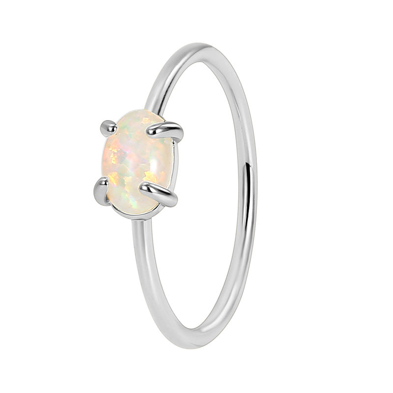 Wholesale Gold Plated Brass Four-Claw Oval White Opal Ring AL585