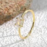 Wholesale Gold Plated Brass Four-Claw Oval White Opal Ring AL585